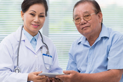 a doctor showing the analysis results to the patient
